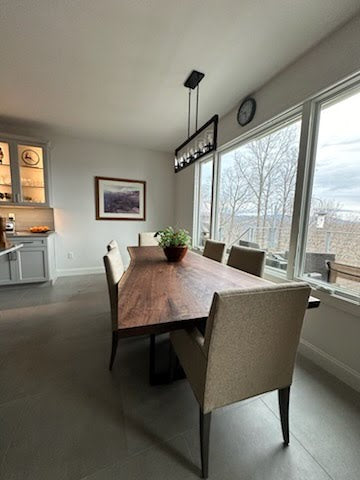 Black Walnut Dining Table with Live Edge and Single Slab Top